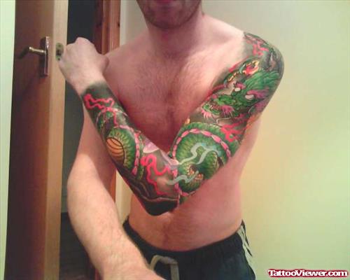 Awesome Colored Dragon Japanese Tattoo On Left Sleeve For Men