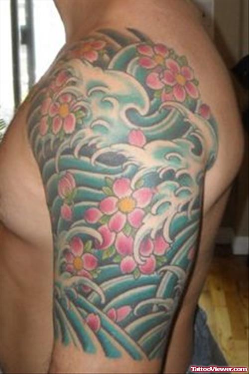 Japanese Color Flowers Tattoo On Left Half Sleeve