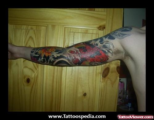 Awful Colored Japanese Tattoo On Man Right Sleeve