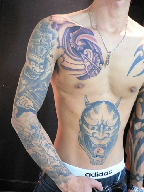 Awesome Grey Ink Japanese Tattoo On Man Full Sleeve