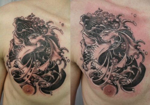 Grey Ink Japanese Tattoo On Man Chest
