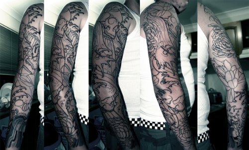 Grey Ink Japanese Tattoo On Man Full Sleeve