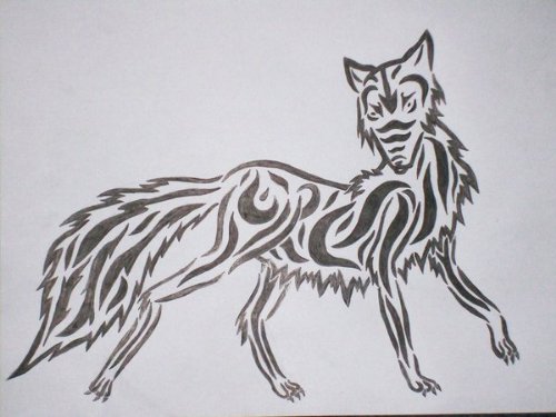 Tribal Joker Head Wolf Tattoo Design
