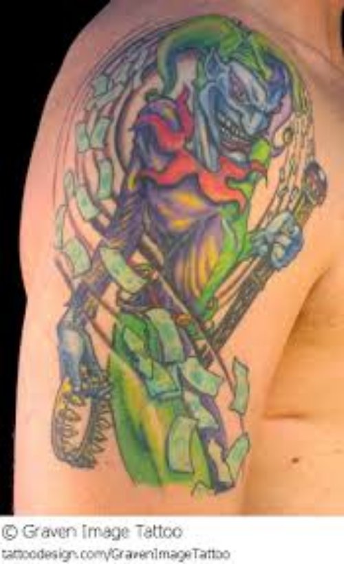 Colored Jester Tattoo On Man Right Half Sleeve