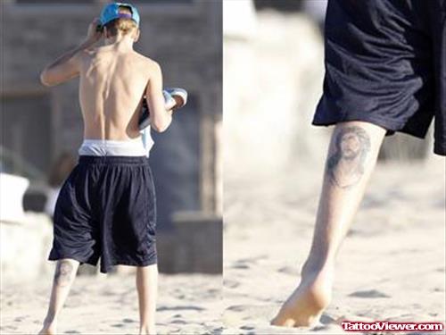 Justin Beiber Jesus Tattoo On Left Back Leg