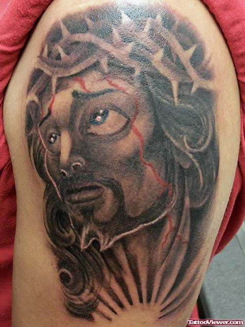 Half Sleeve Jesus Head Tattoo On Shoulder