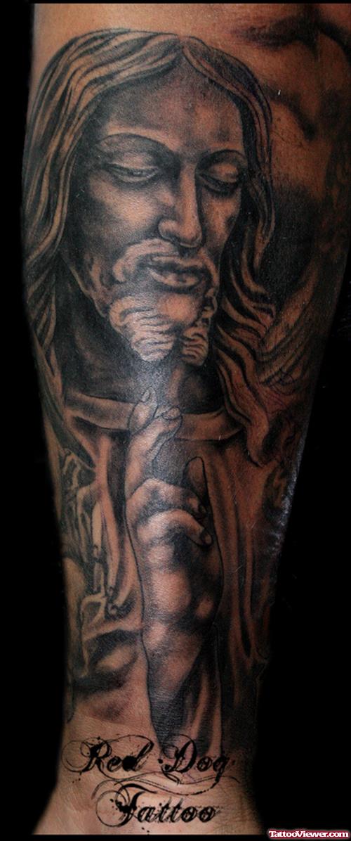 Grey Ink Jesus Tattoo On Arm Sleeve