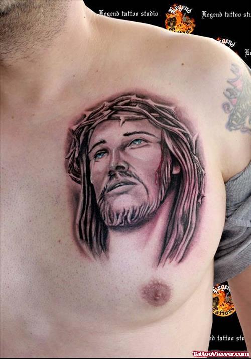 Grey Ink Jesus Head Tattoo On Man Chest For Men