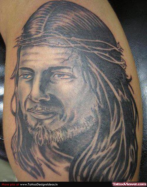 Unique Grey Ink Jesus Head Tattoo