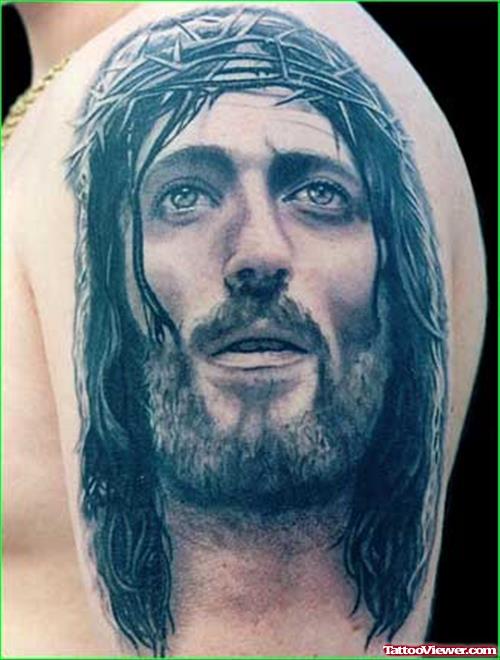 Realistic Jesus Tattoo On Man Left Half Sleeve