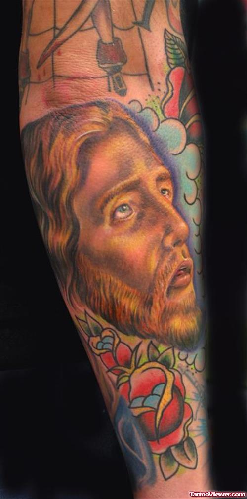 Jesus Tattoo On Right Sleeve