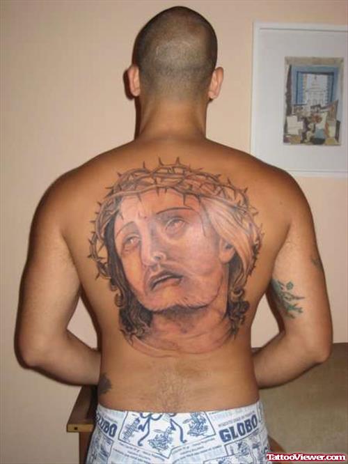 Grey Ink Jesus Head Tattoo On Back