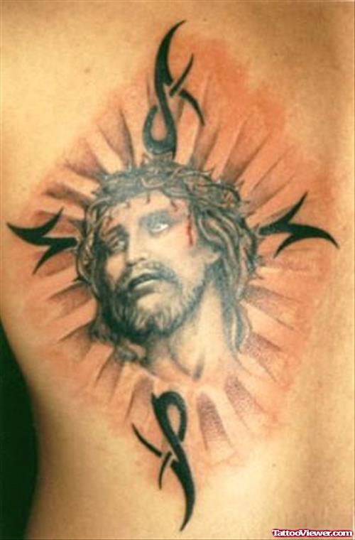 Black Tribal And Jesus Head Tattoo