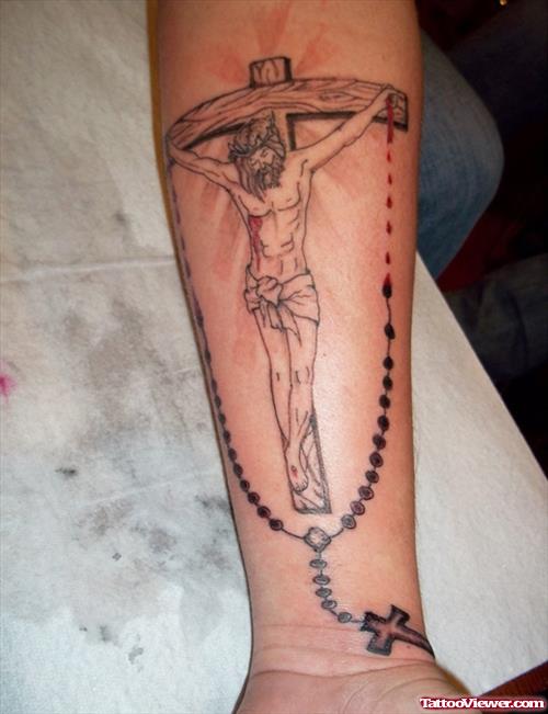 Rosary And Jesus Cross Tattoo on Forearm