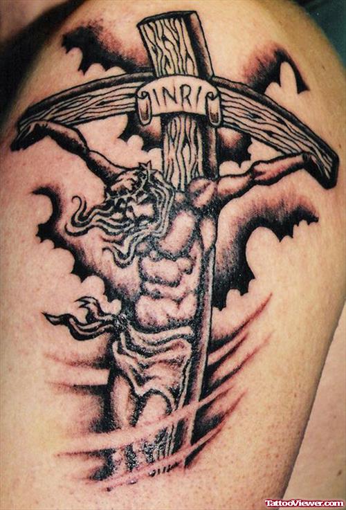Grey Ink Cross and Jesus Tattoo On Left Half Sleeve