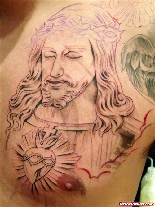 Sacred Heart and Jesus Tattoo On Man Chest