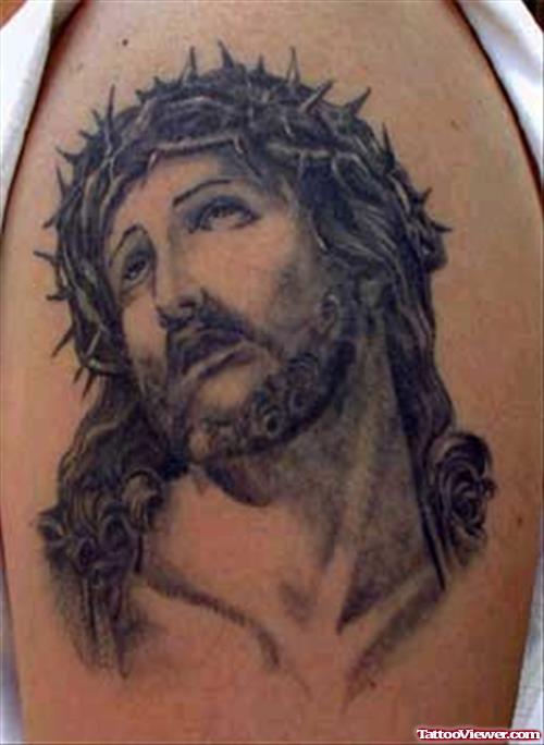 Left Bicep Jesus Tattoo