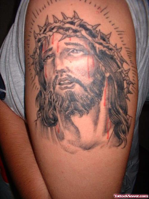 Jesus Christ Tattoo On Left Biceps
