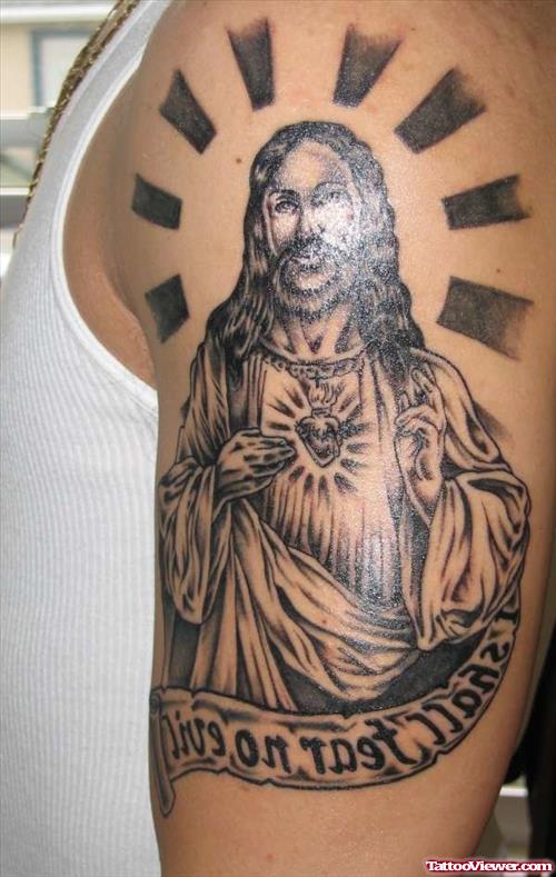 Black Ink Jesus Tattoo On Man Left Half Sleeve