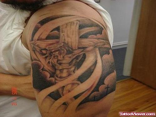 Grey Ink Jesus Tattoo On Man Left Shoulder