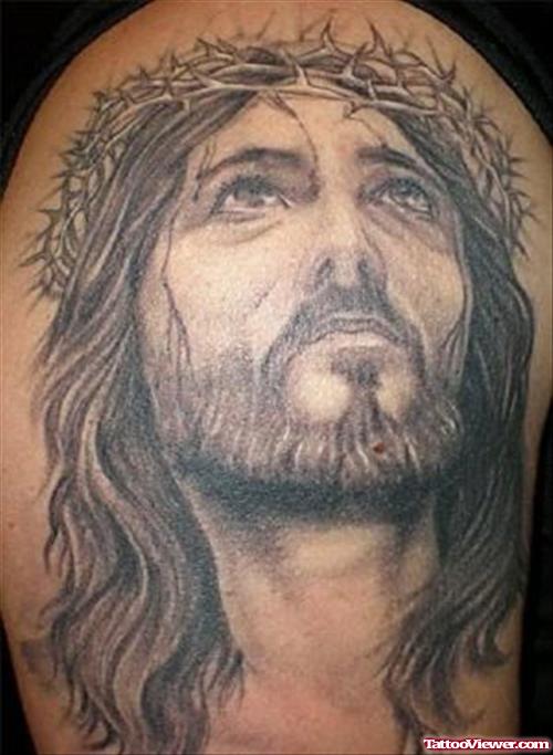 Grey Ink Jesus Christ Head Tattoo On Half Sleeve