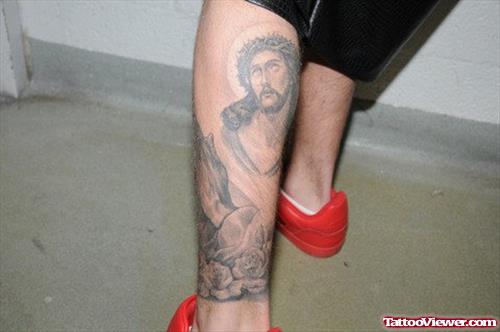 Grey Ink Jesus Tattoo On Right Leg
