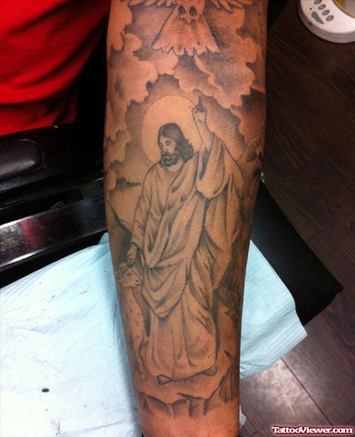Beautiful Grey Ink Jesus Tattoo On Sleeve