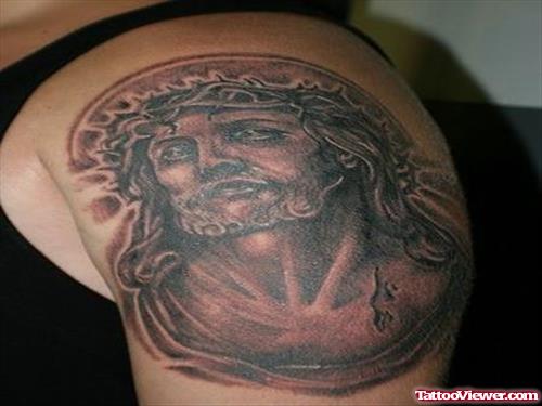 Awful Grey Ink Jesus Tattoo On Left Shoulder