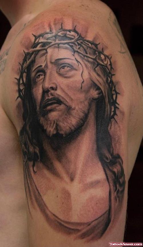 Jesus Portrait Tattoo On Man Left Half Sleeve