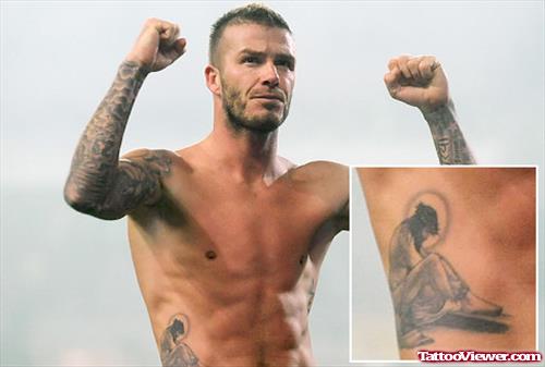 Grey Ink Jesus Tattoo On Beckham Right Sleeve
