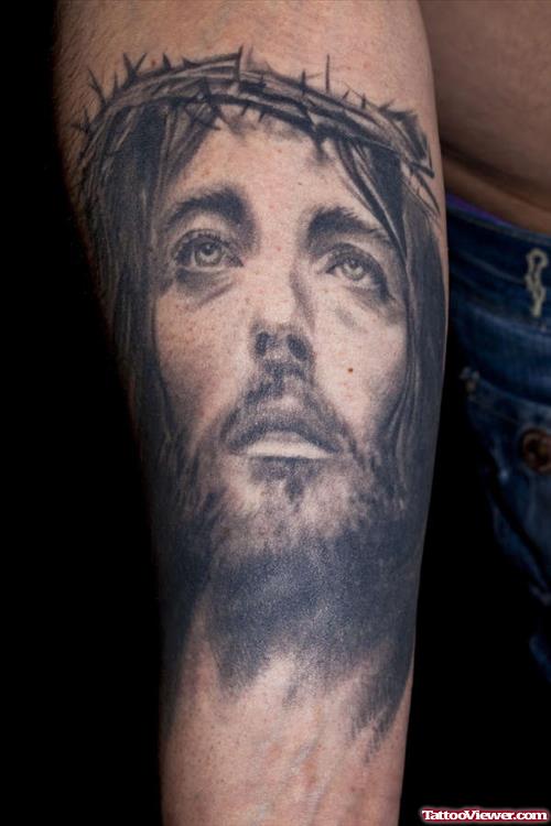 Grey Ink Jesus Head Tattoo On Half Sleeve