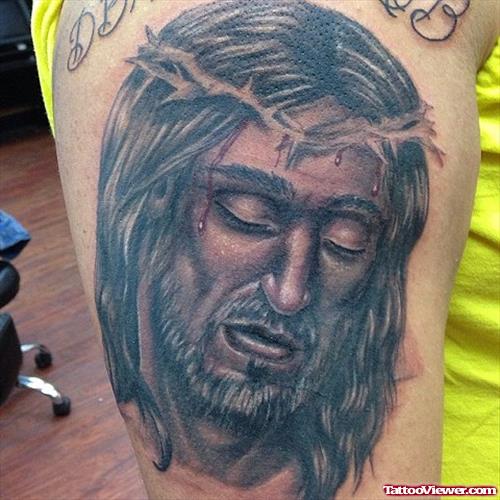 Grey Ink Jesus Head Tattoo On Side Leg