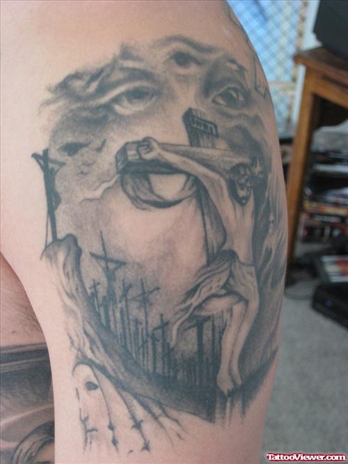 Grey Ink Jesus Christ Face Tattoo On Shoulder