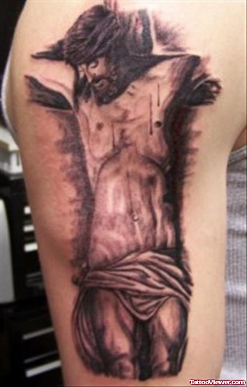 Grey Ink Jesus Tattoo On Man Half Sleeve