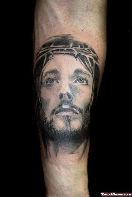 Awesome Jesus Face Tattoo On Left Forearm