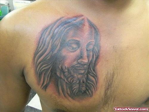 Awful Grey Ink Jesus Head Tattoo On Man Chest