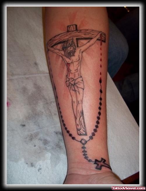 Rosary And Jesus On Cross Tattoo On Arm