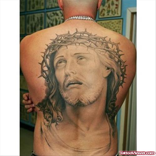 Grey Ink Jesus Head Tattoo On Man Back