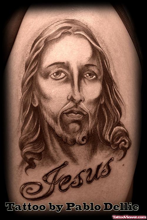 Grey Ink Jesus Face Tattoo On Right Shoulder