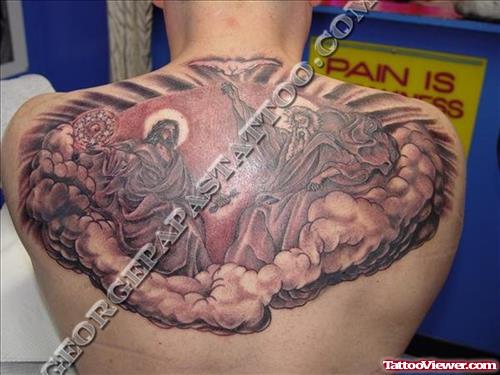 Grey Ink Jesus Tattoo On Man Upperback
