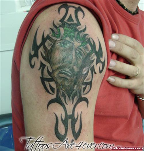 Black Tribal Cross And Jesus Christ Head Tattoo On Right Shoulder