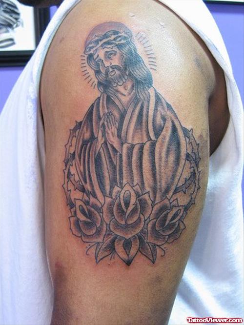 Grey Rose Flowers and Jesus Tattoo On Left Bicep