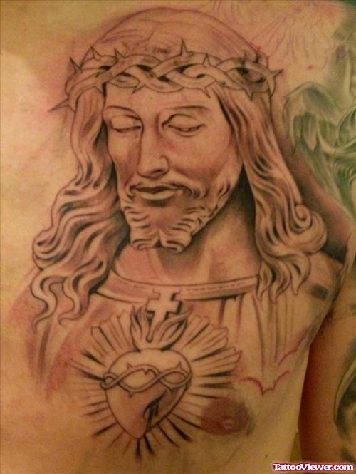 Grey Ink Sacred Heart and Jesus Tattoo On Man Chest
