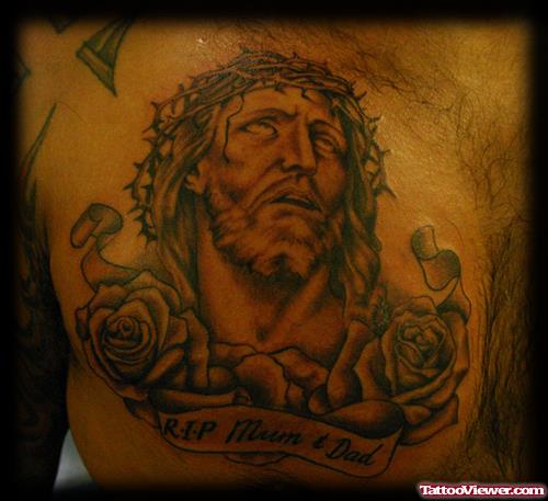 Rose Flowers And Jesus Head Tattoo On Man Chest