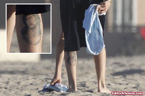 Justin Beiber Jesus Christ Tattoo On Left Back Leg