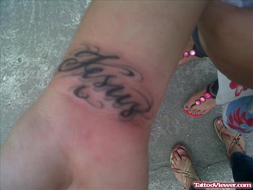 Jesus Word Tattoo On Wrist