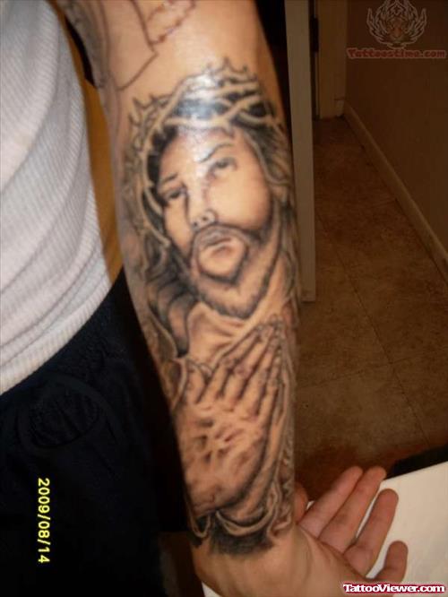 Jesus Face And Praying Hands Tattoo