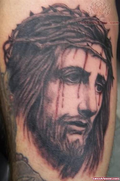 Jesus Injured Face Tattoo