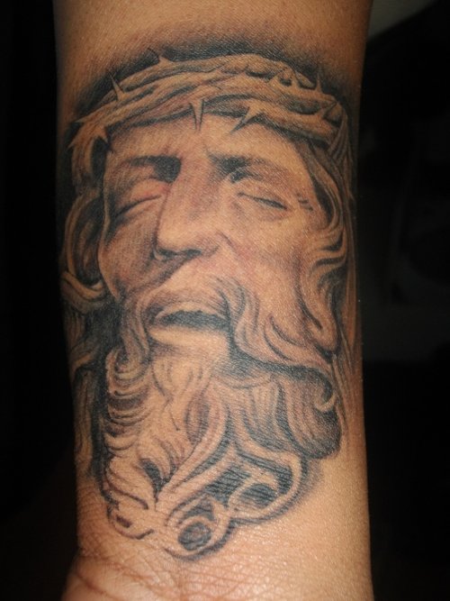 Realistic Grey Ink Jesus Head Tattoo