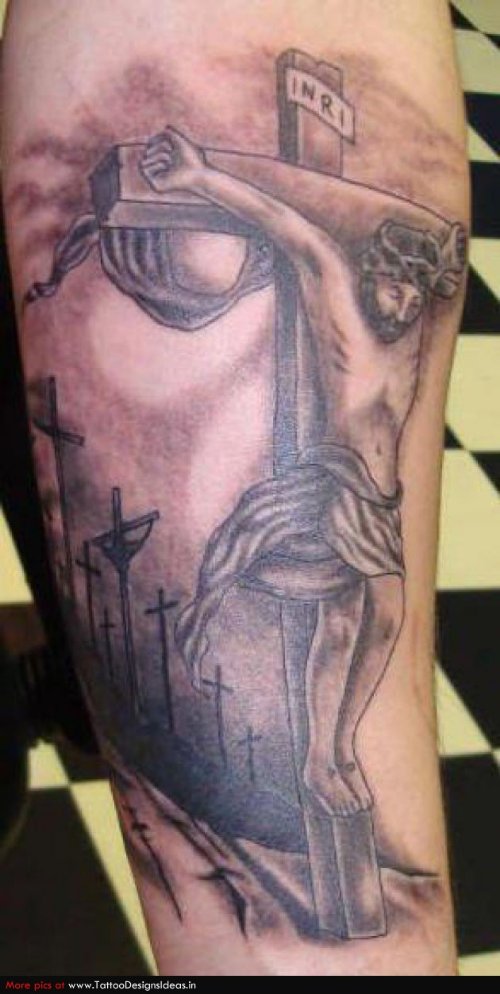 Cross And Jesus Face Tattoo On Arm